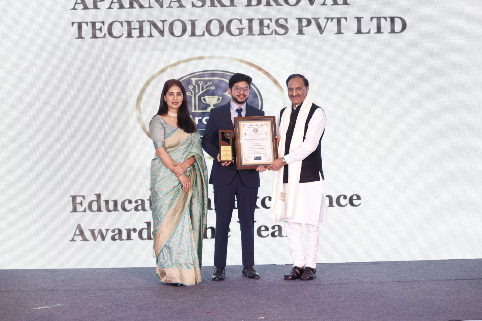 BrovAI representative receiving an education award on stage